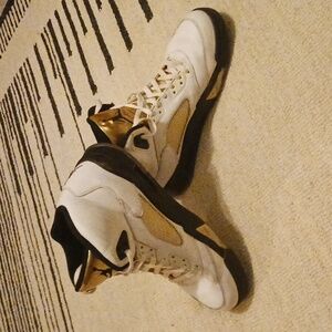 Jordan White and Gold High-Top Sneakers